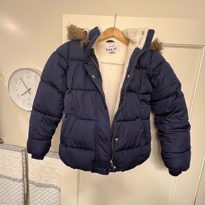 Old navy puffer jacket with fleece lining on body and hood. Size large girls.